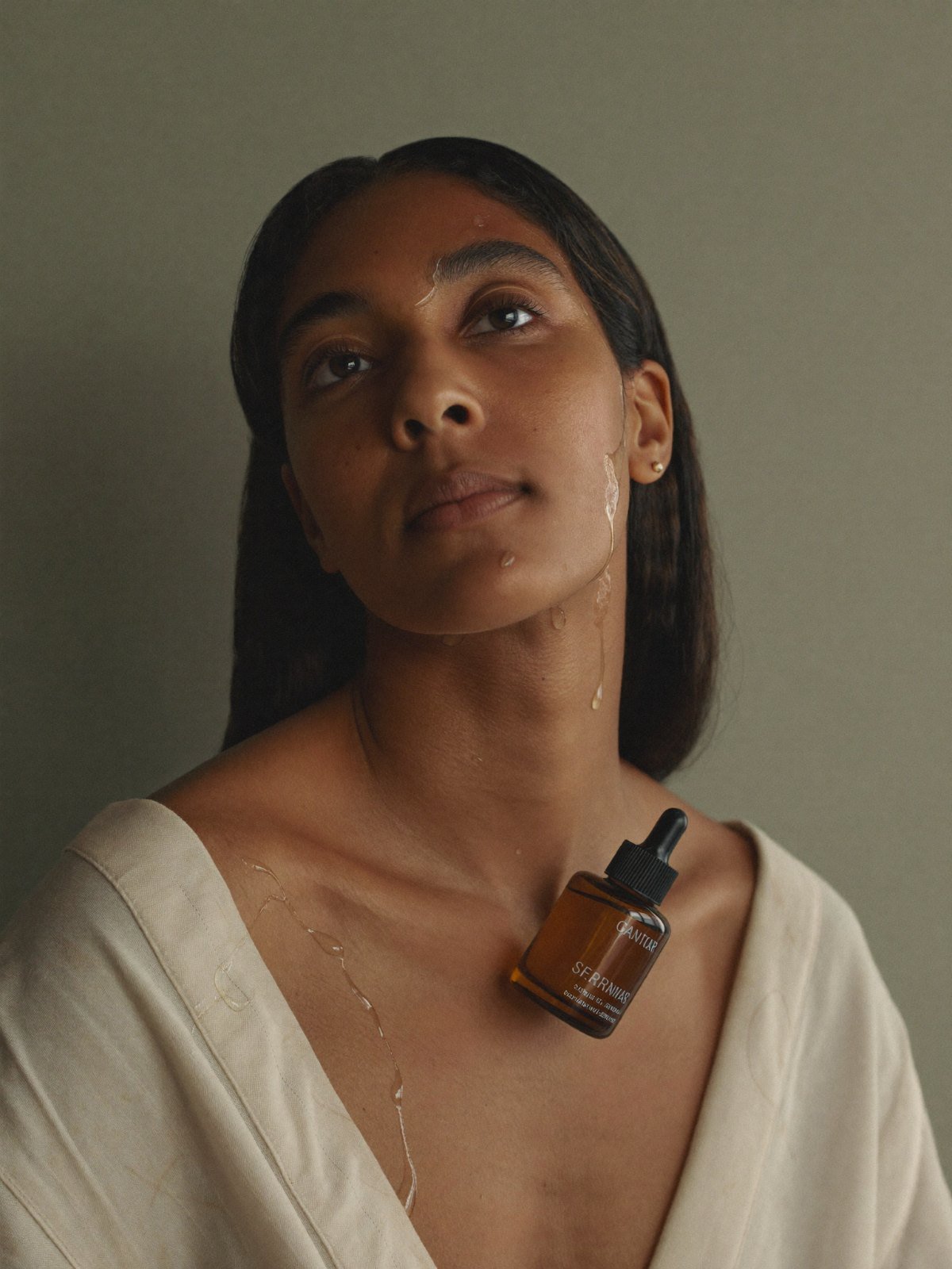Serum resting against the collarbone
